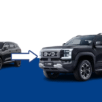BYD Shark hybrid pickup truck parked off-road in rugged terrain