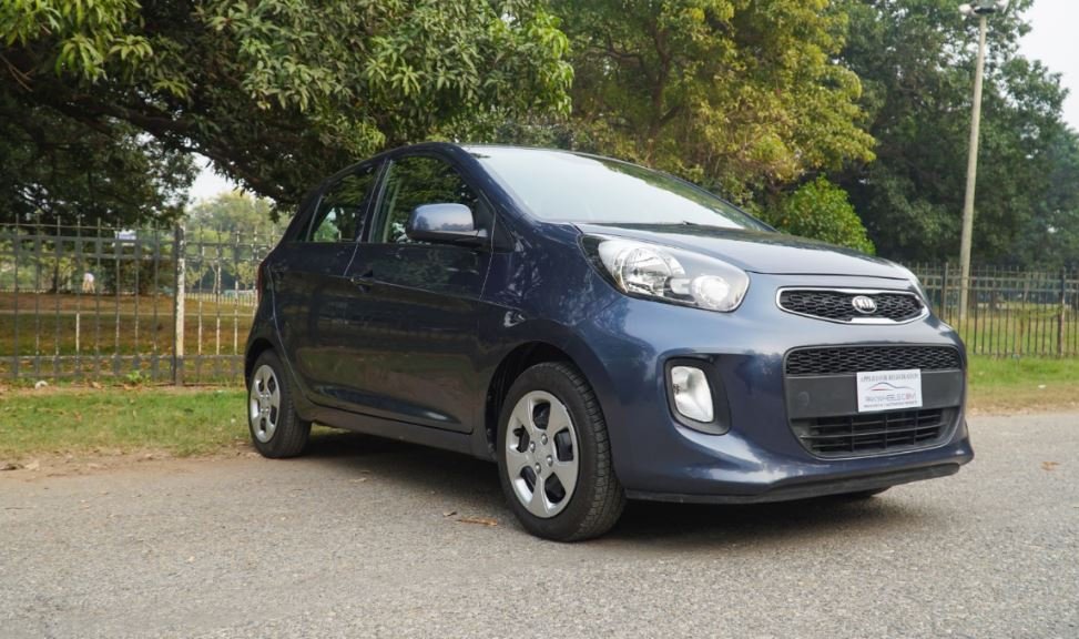 Kia Picanto in Pakistan – compact urban hatchback parked in city street